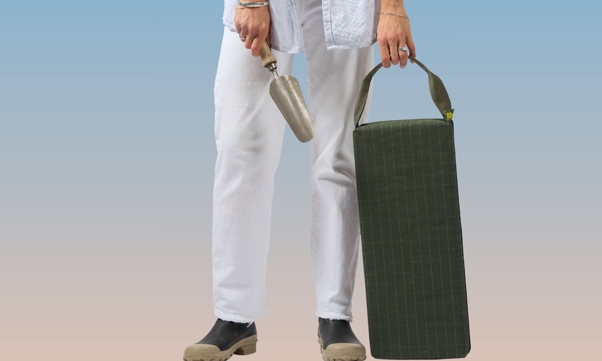 Padded gardening kneeler protecting knees during weeding