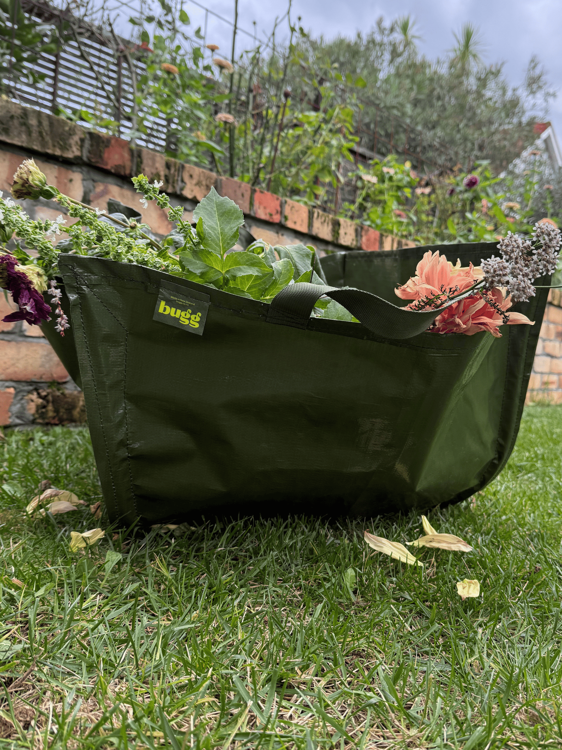 Khaki Bugg garden bag with sturdy handles and spacious main compartment for garden tools and supplies.