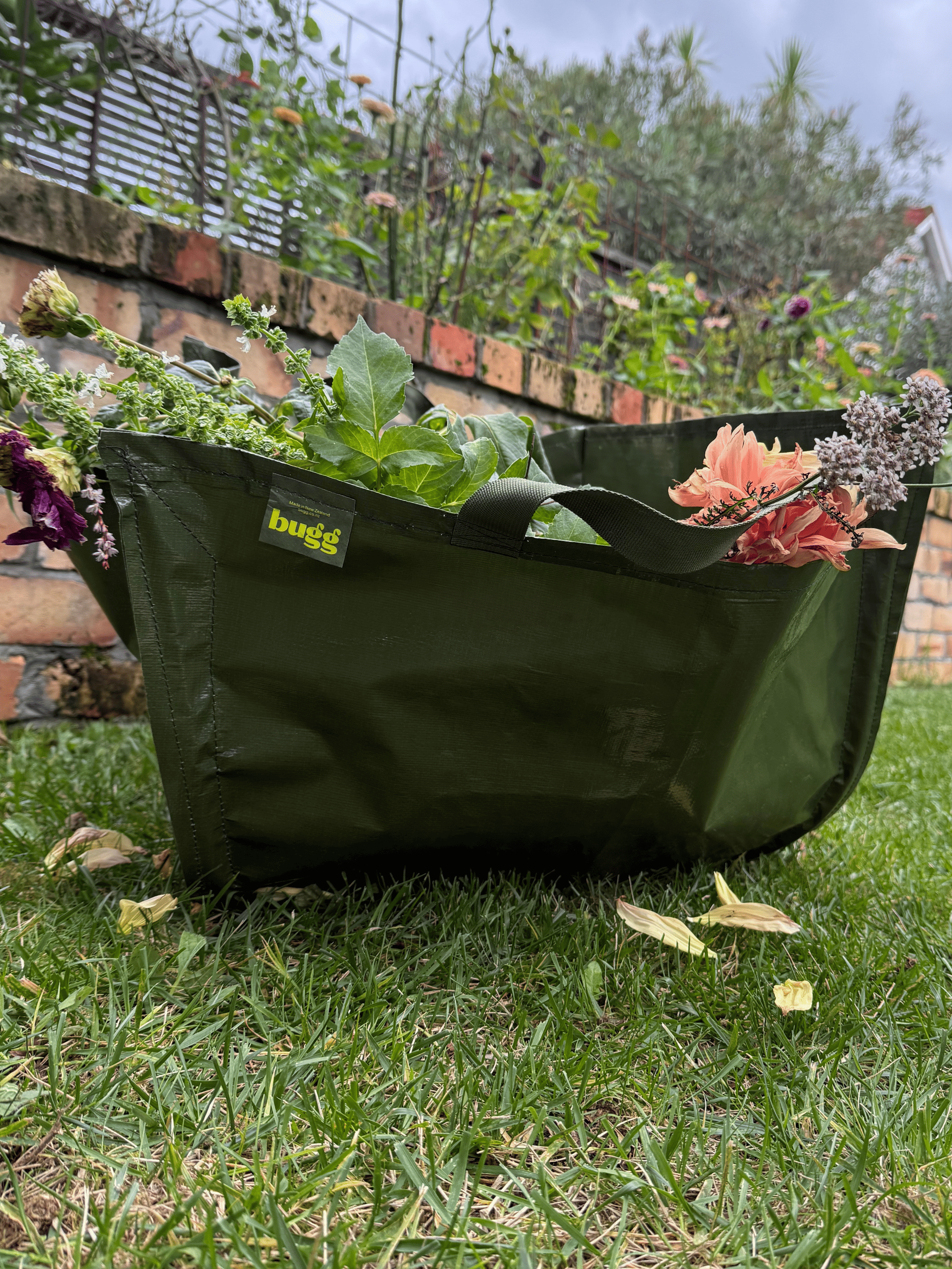 Khaki Bugg garden bag with sturdy handles and spacious main compartment for garden tools and supplies.
