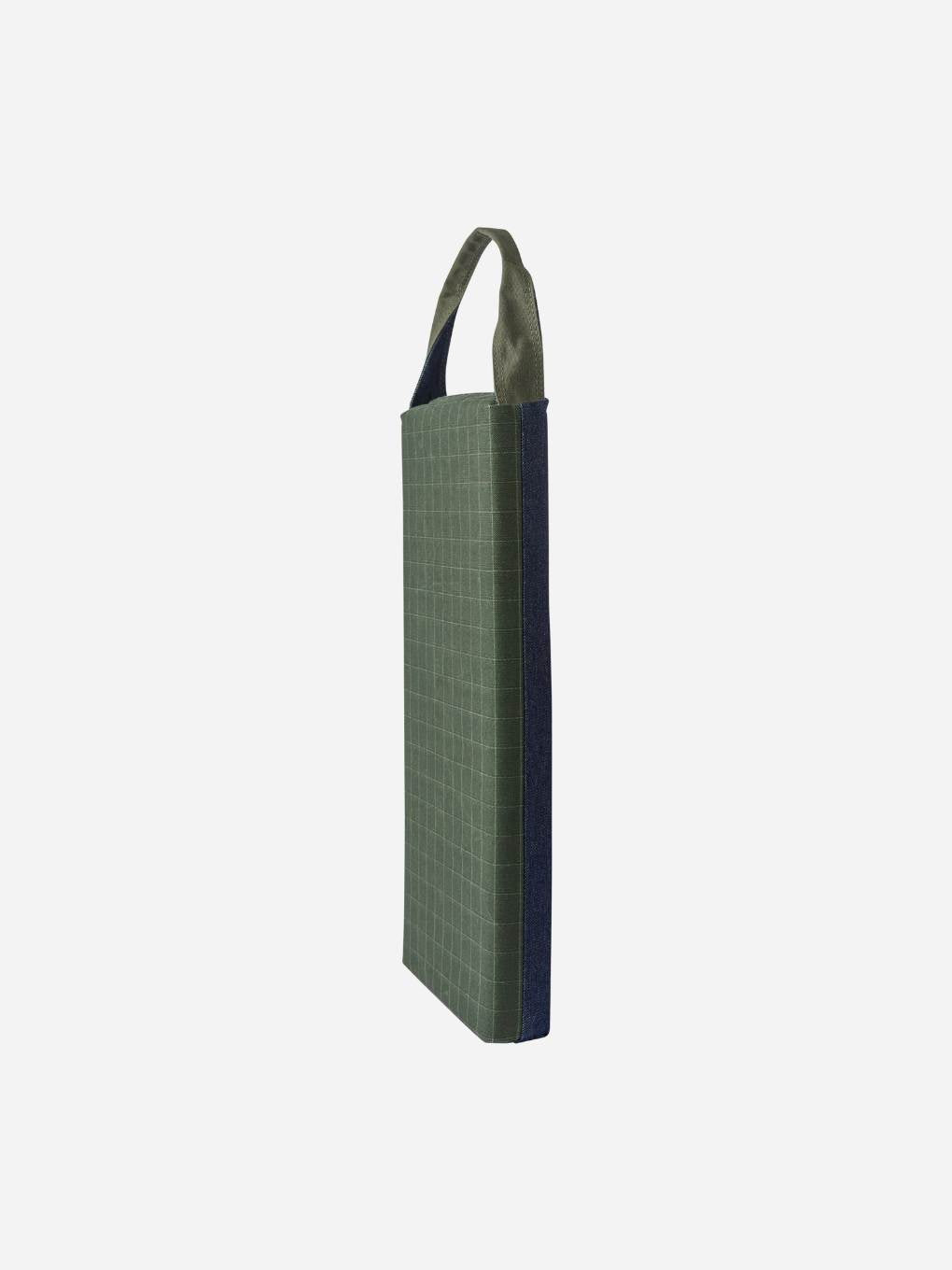 Bugg limited edition denim kneeler with padded cushion for gardening or kneeling tasks, stylish and comfortable outdoor accessory.