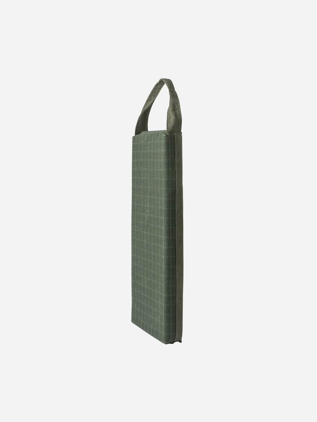 Bugg limited edition khaki kneeler with cushioned surface and sturdy handles for gardening or kneeling tasks.