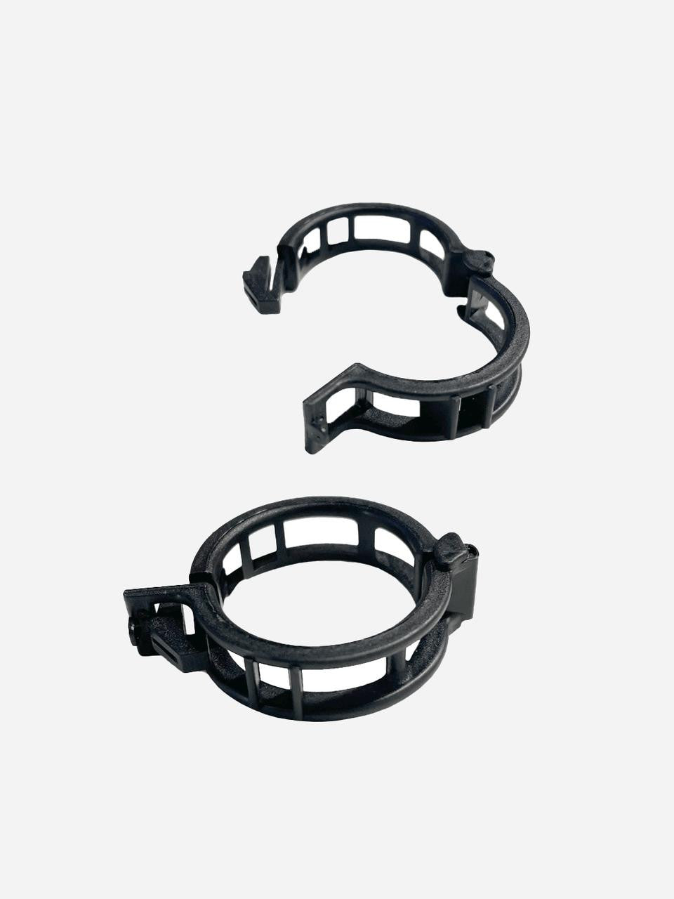 Bugg Tomato Stem Clip, set of 25, visible with green plastic clips designed for supporting tomato plant stems.