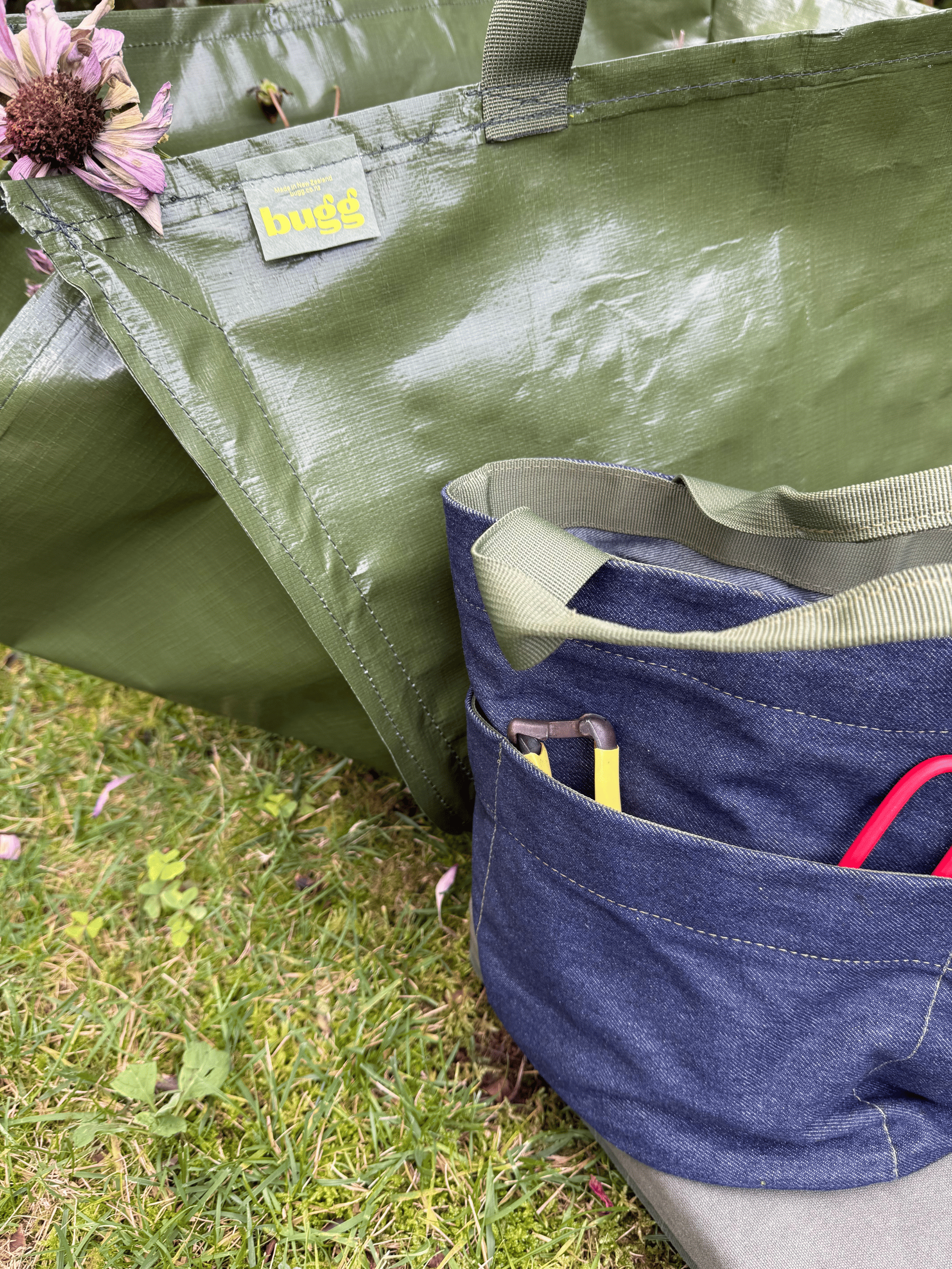 Khaki garden bag by Bugg with sturdy handles, ideal for outdoor gardening and storage.
