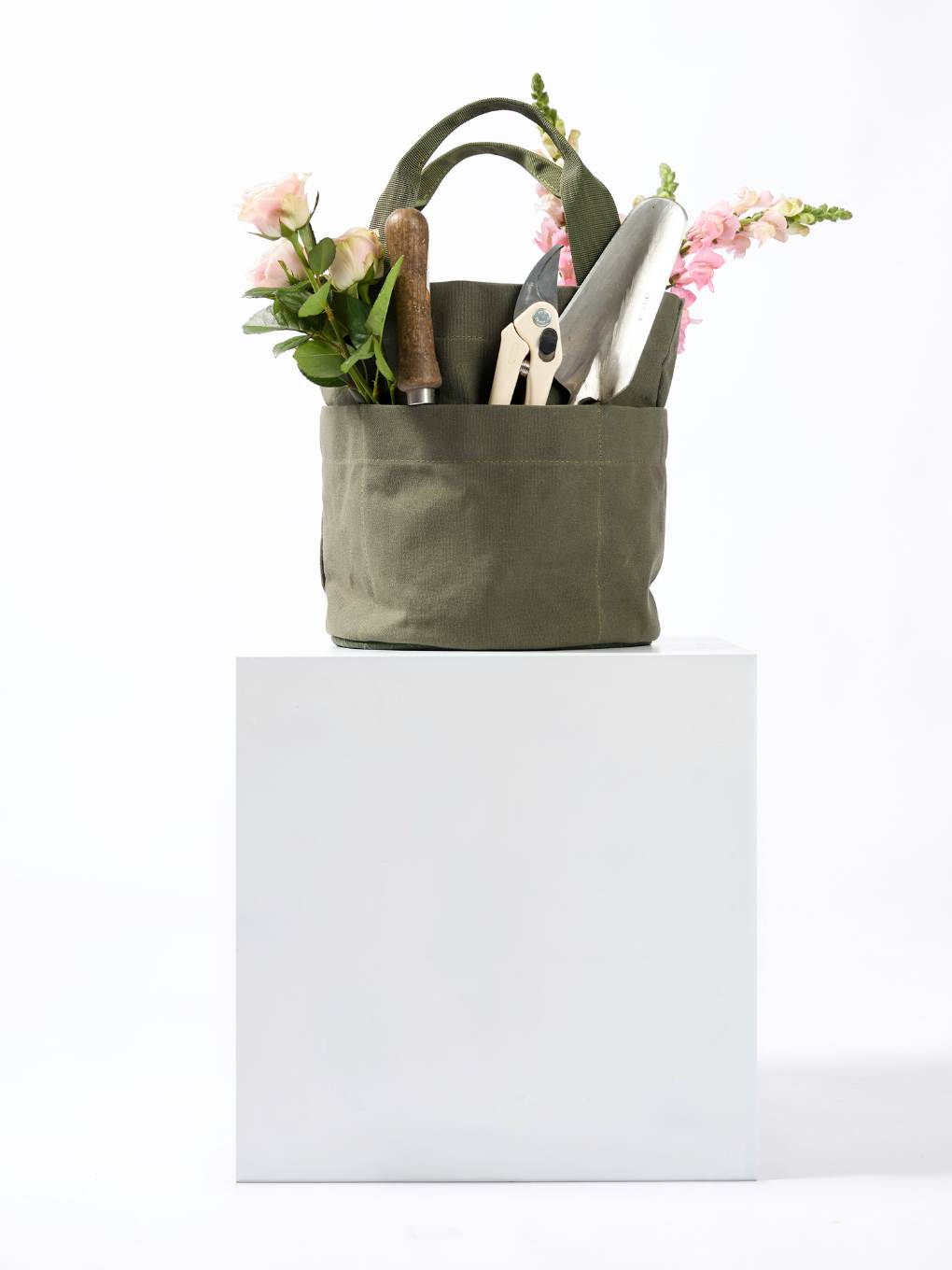 Bugg Limited Edition khaki tote bag with spacious interior and sturdy handles, stylishly designed for everyday use.