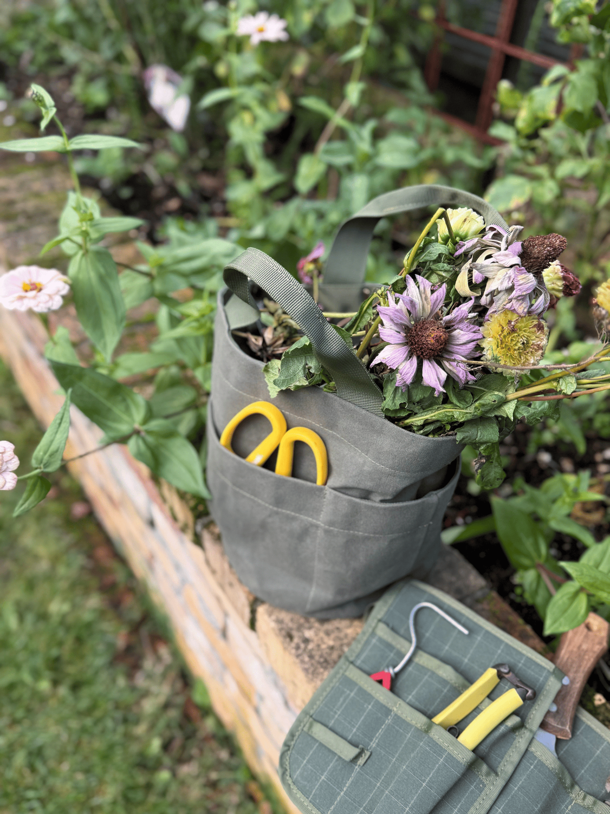 Bugg limited edition khaki tote bag with spacious design and sturdy handles, perfect for everyday use.