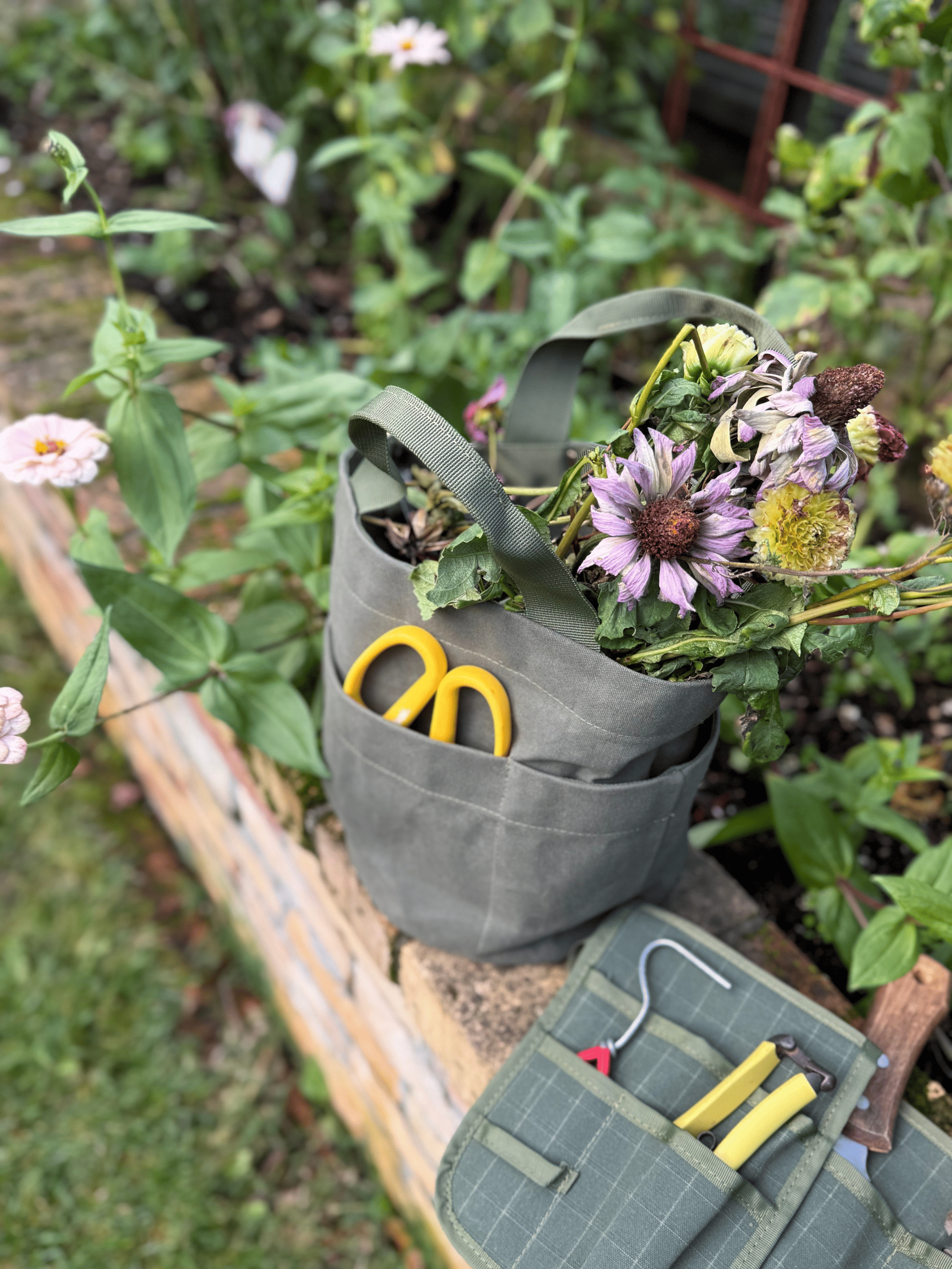 Bugg limited edition khaki tote bag with spacious design and sturdy handles, perfect for everyday use.
