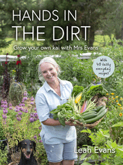 Close-up of hands in the dirt from the book "Hands in the Dirt" by Leah Evans, published by Bugg NZ.