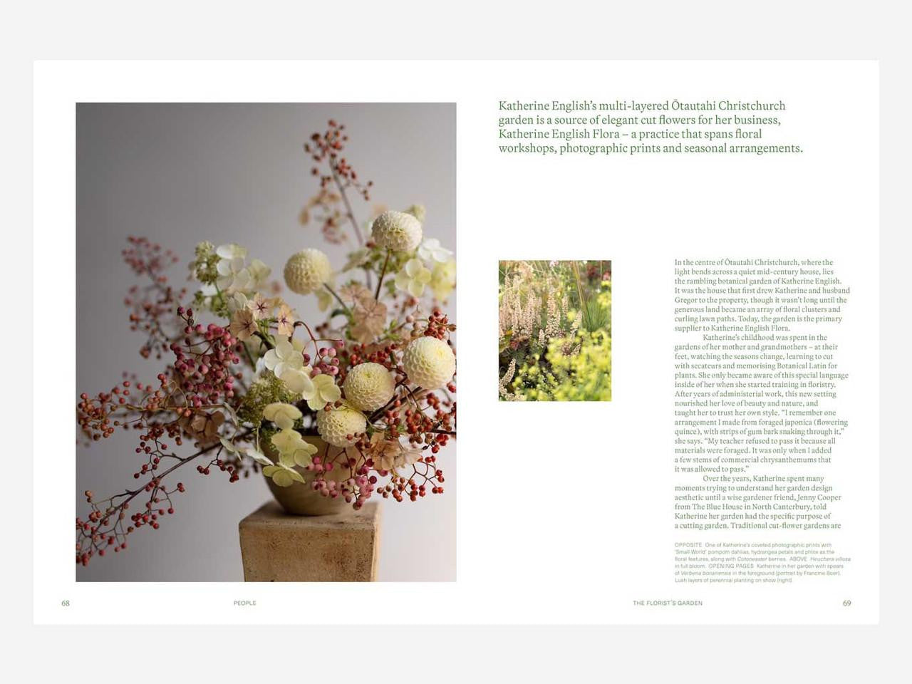 Open sage-colored journal titled Sage Journal Vol. 1 by Bugg NZ with lined pages and soft cover.