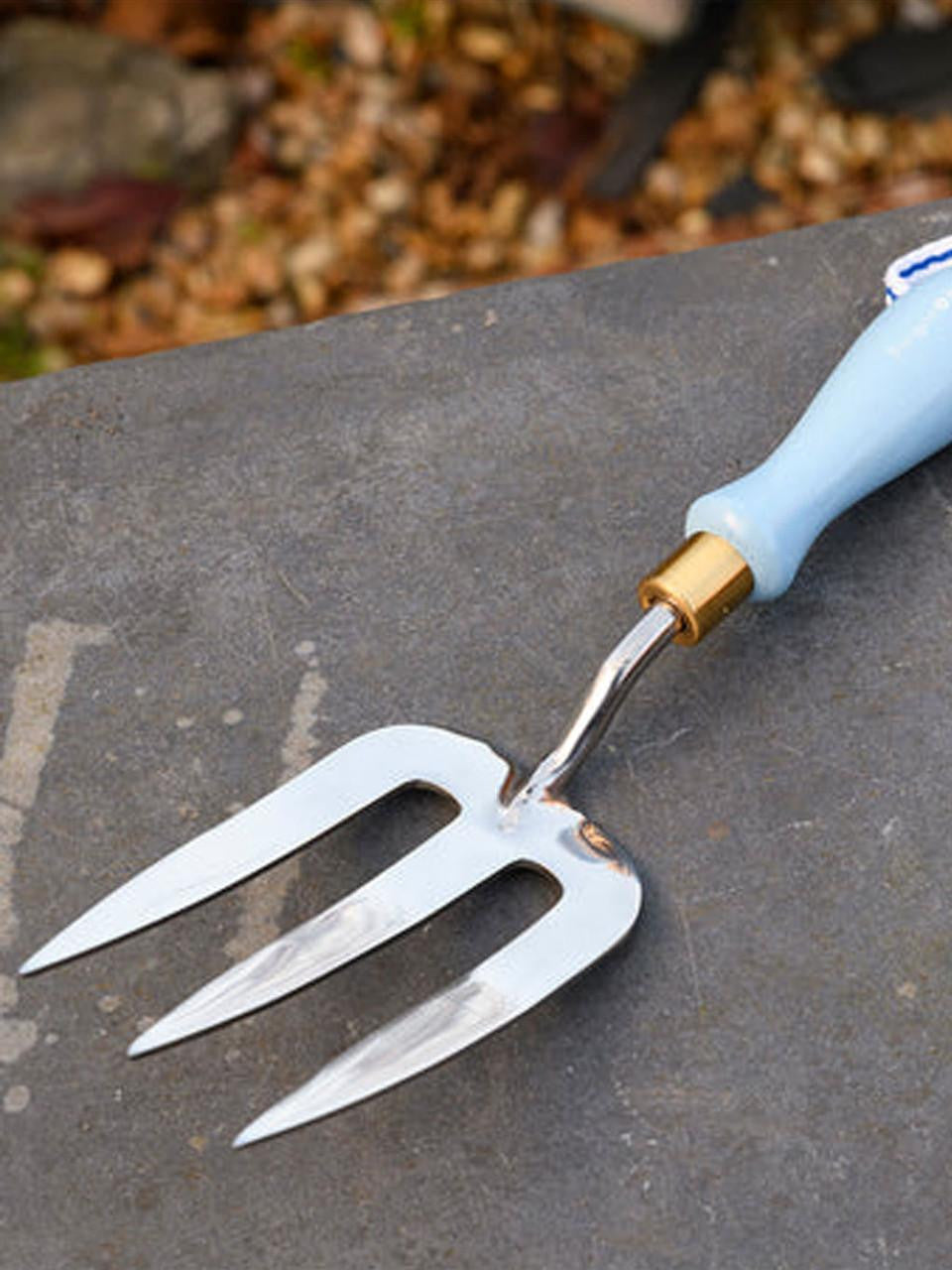 Blue Burgon & Ball Collector Hand Fork with ergonomic handle for gardening and soil cultivation.
