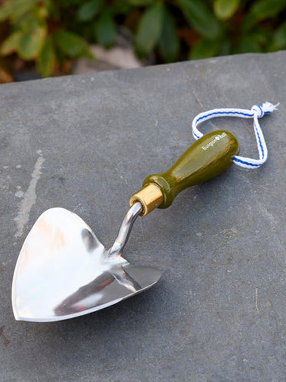 Burgon & Ball Collector Planting Trowel in olive green with a wooden handle, ideal for gardening and planting tasks.