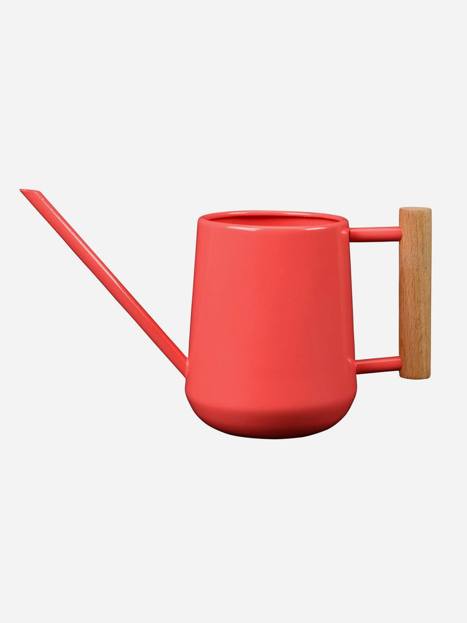 Indoor watering can by Burgon & Ball in coral color, with a curved spout and ergonomic handle for easy plant watering.