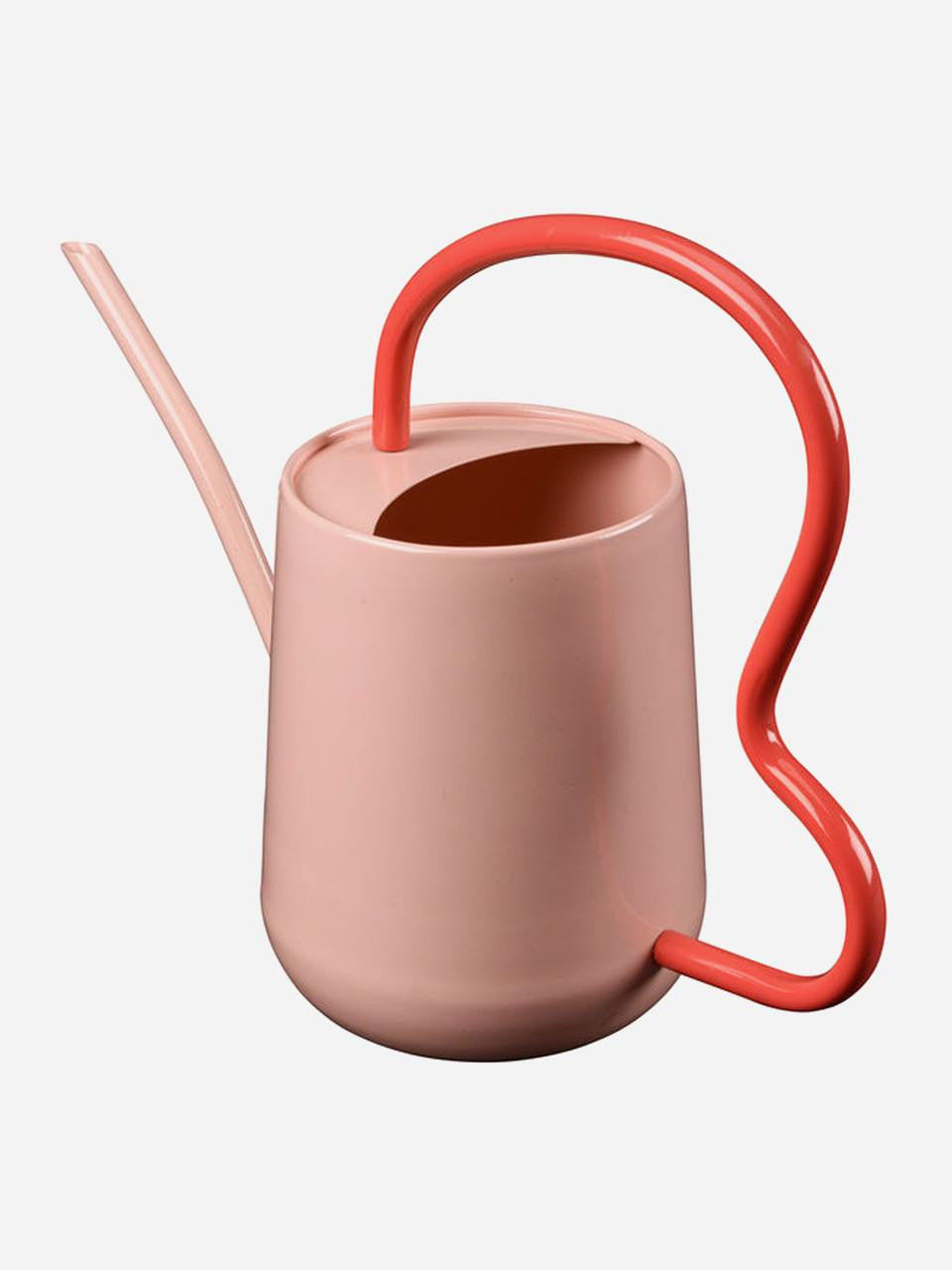 Blush-colored scalloped indoor watering can by Burgon & Ball with a stylish, decorative design for indoor plant watering.