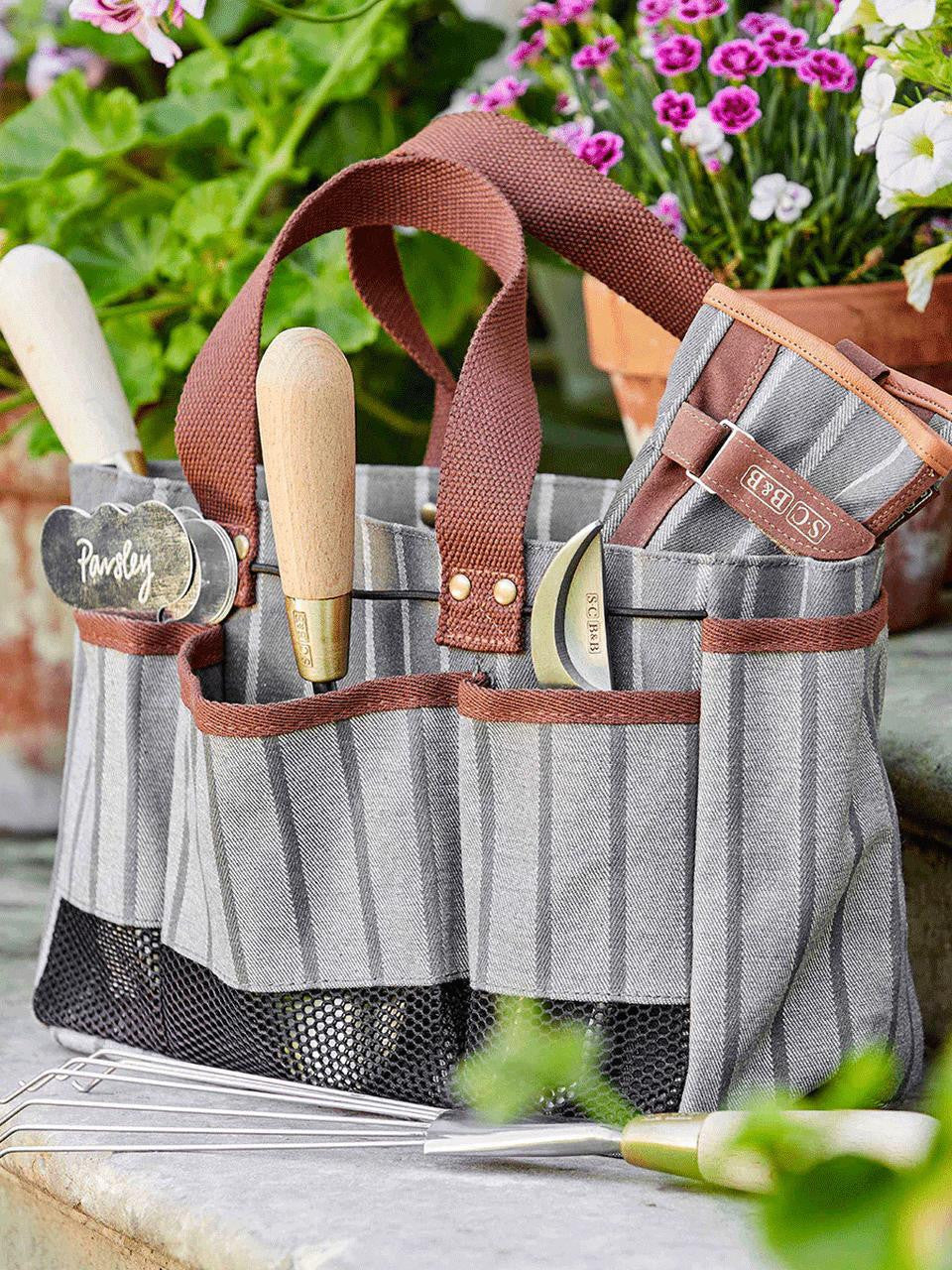 Navy Sophie Conran Tool Bag by Burgon & Ball with leather handles and multiple pockets for garden tools and accessories.