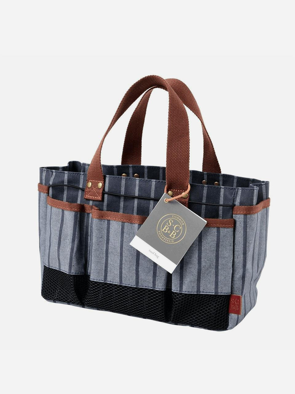Navy Sophie Conran tool bag by Burgon & Ball with leather handles and multiple compartments for gardening tools.