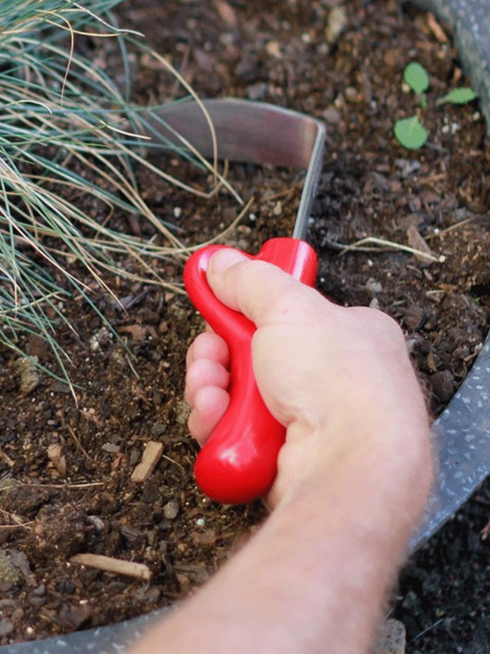 Clark Cultivator showing its adjustable tines and sturdy frame, ideal for garden cultivation and soil preparation.