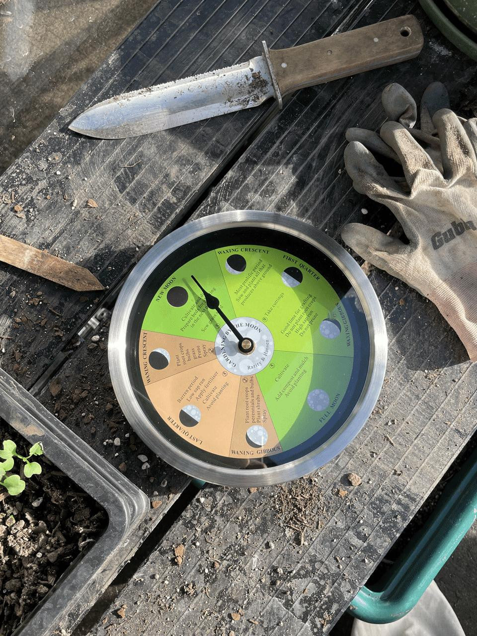 Gardening by the Moon Clock Bright by Cruising Electronics, featuring a sleek design and lunar calendar for gardening planning.