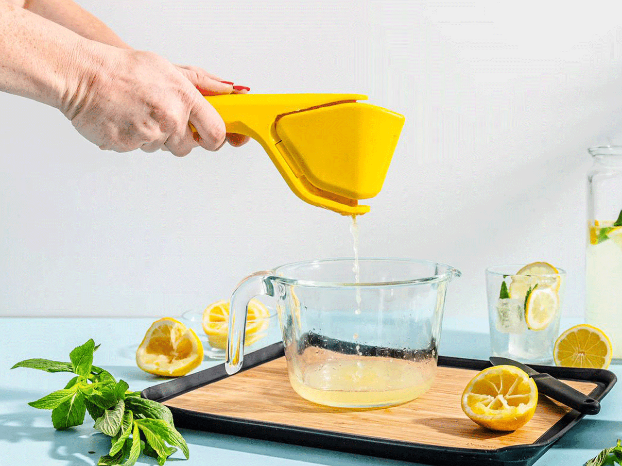 Dreamfarm Fluicer kitchen tool with a sleek design, used for efficient citrus juicing and zesting in the kitchen.