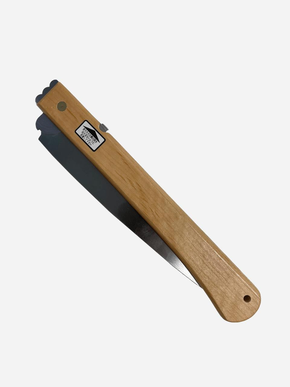 Folding pruning saw with fine teeth by Elephant Tools, featuring a compact design and sharp blade for precise trimming.