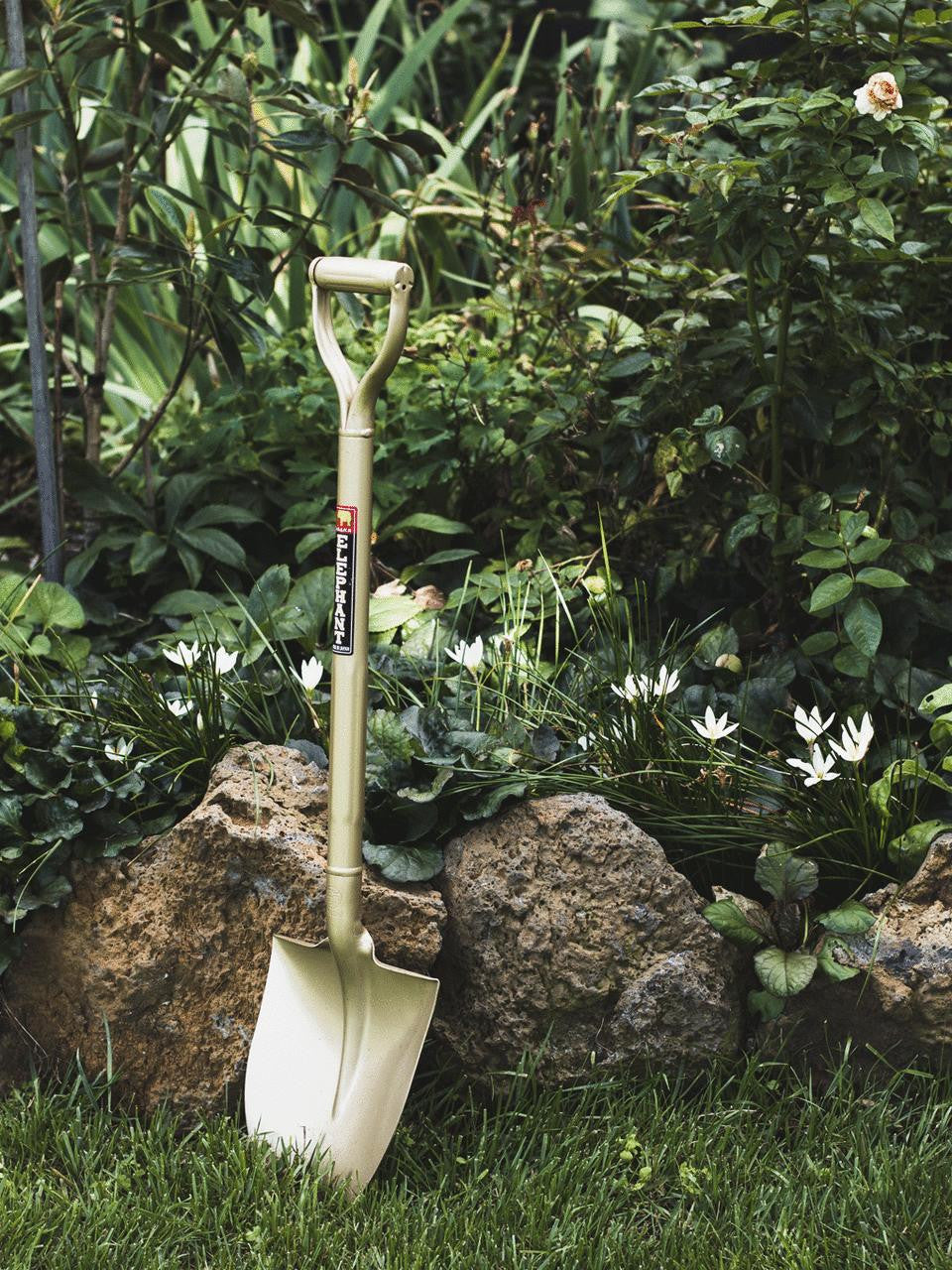 Golden Spade by Elephant Tools, small garden shovel with a sturdy metal blade and ergonomic handle for gardening tasks.