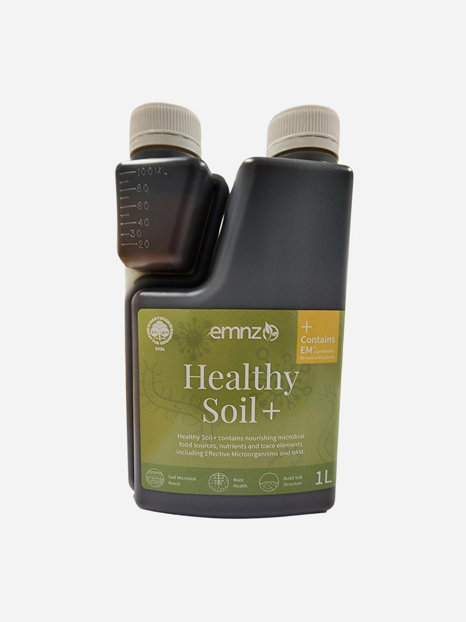 Healthy Soil+ by EMNZ, organic soil amendment with rich nutrients, shown in a close-up of dark, fertile soil ready for planting.