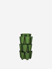 GreenStalk 3-tier vertical planter with lush green plants in an outdoor setting, showcasing its tiered design and vibrant foliage.