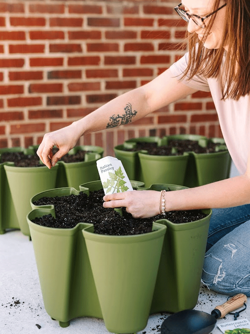 GreenStalk 5-tier original vertical planter in evergreen, featuring multiple staggered plant tiers and a sleek, modern design.