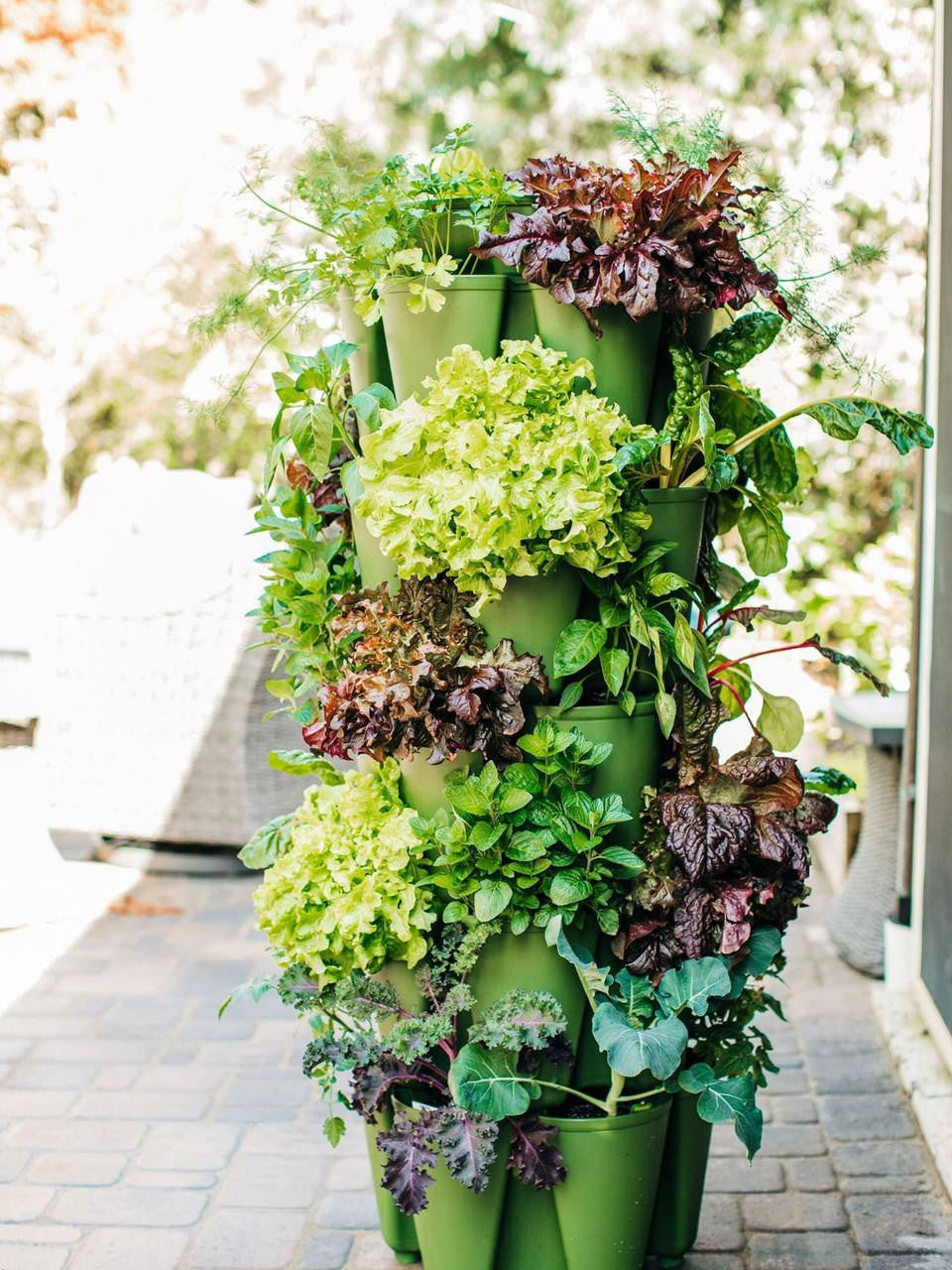 GreenStalk 5-tier vertical planter in evergreen color with multiple planting levels for indoor or outdoor gardening.