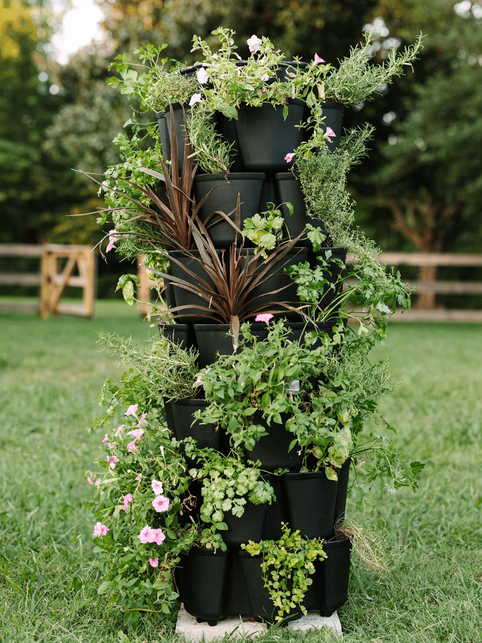 GreenStalk 7-tier vertical planter in elegant black, showcasing multiple planting tiers for urban gardening and plant display.