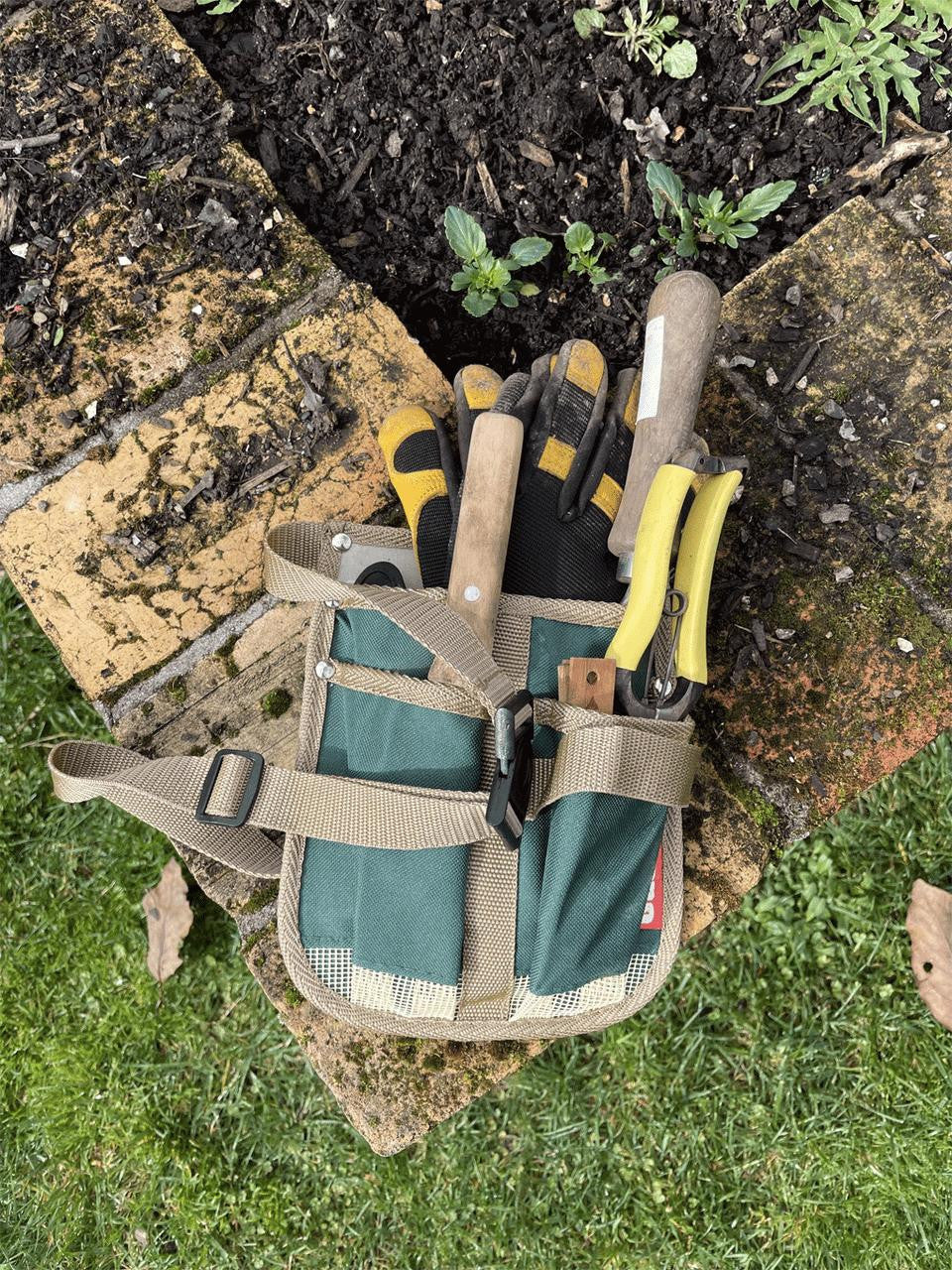 Gubba 3 Pocket Tool Pouch with durable fabric and multiple compartments for organizing tools and accessories.