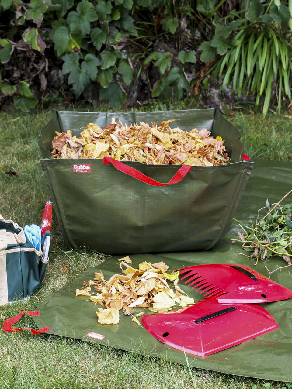 Gubba Garden Mat laid out on a patio, showing its durable, weather-resistant surface for outdoor gardening and patio use.