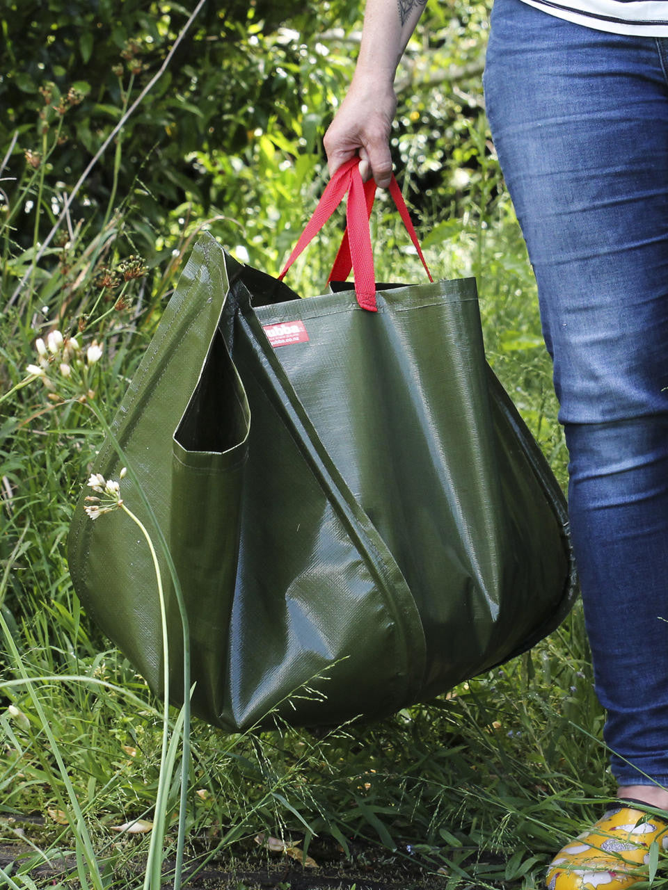 Gubba Garden Bag wrapped for use, durable and spacious for outdoor yard waste or gardening debris.