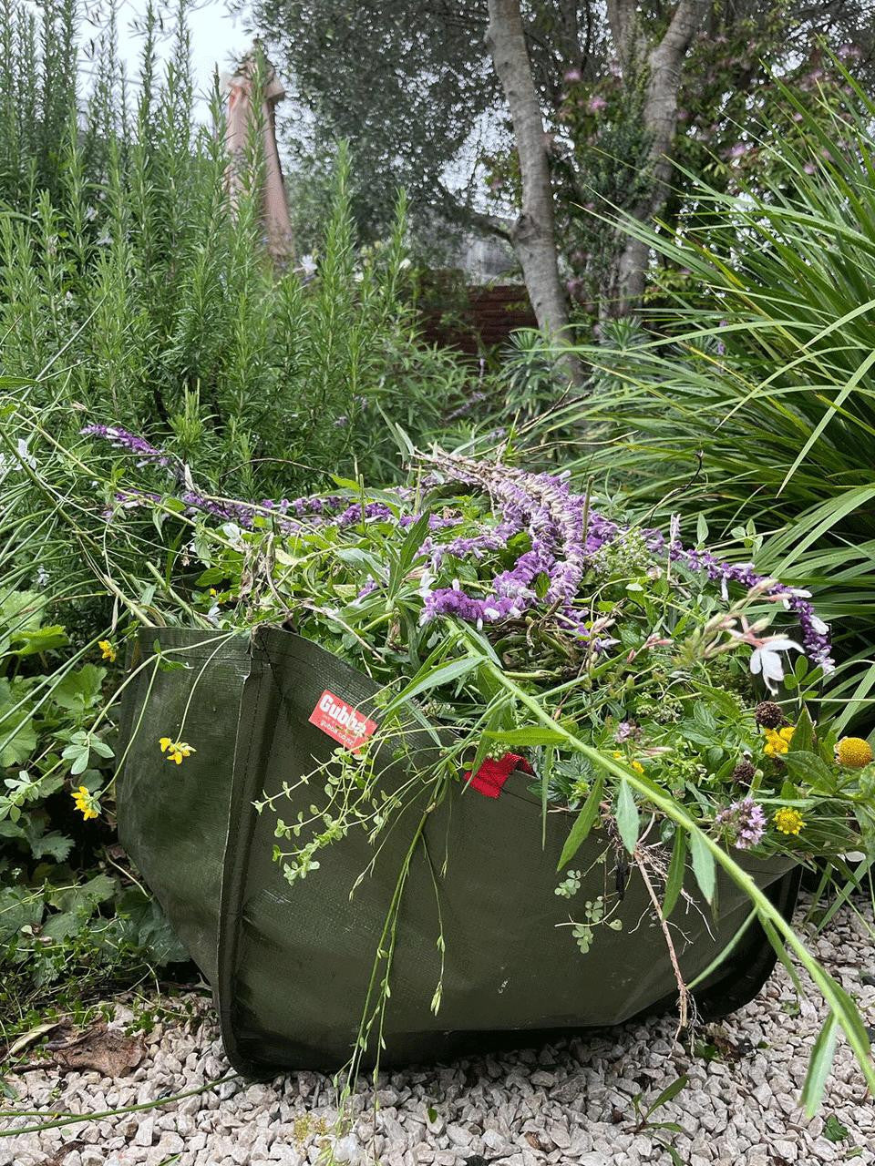 Wrapped Gubba garden bag for yard cleanup, showcasing durable material and compact design for outdoor gardening tasks.