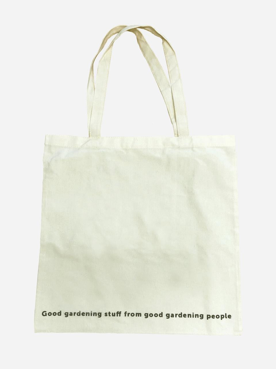 Organic cotton tote bag by Gubba, showing a natural beige fabric with sturdy handles and simple design for everyday use.
