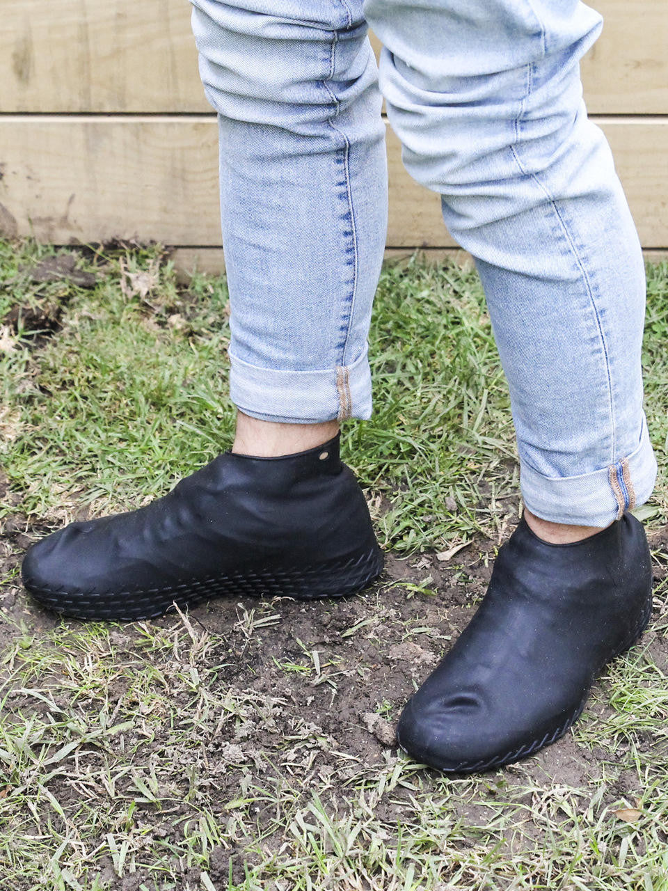 Gubba silicone overshoes in black, flexible waterproof footwear for protection against wet conditions.