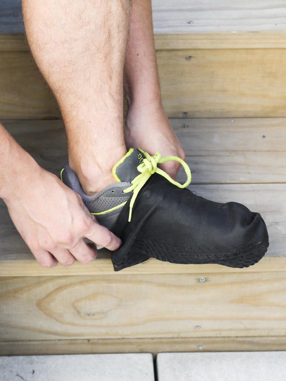 Gubba silicone overshoes in black, lightweight waterproof footwear covering shoes for protection against rain and mud.