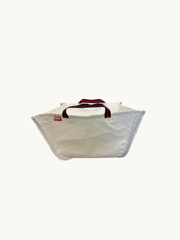 Navy Gubba laundry bag made of durable fabric with a drawstring closure for organizing and transporting laundry easily.