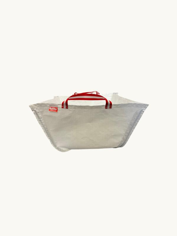 Navy Gubba laundry bag with handles, made of durable fabric, designed for easy carrying and storage of laundry.