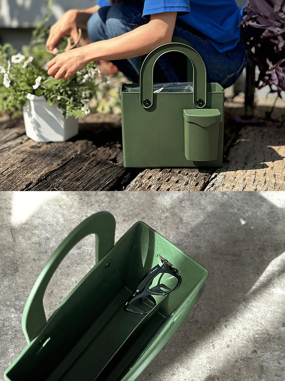 Green Hachiman garden tool bag with multiple compartments and sturdy handles for organizing gardening tools.