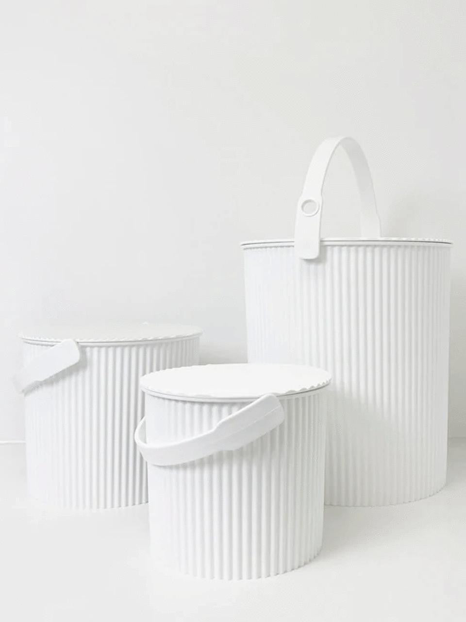 White Omnioutil Super Bucket by Hachiman, available in 3 sizes, including a small 4-liter version with sturdy handles.