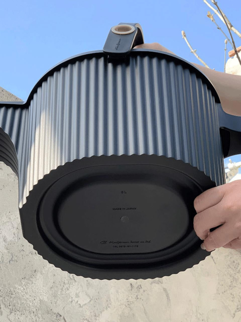 Black Hachiman Garden Beetle Watering Can with a small 1.5L capacity, featuring a compact design for easy watering.
