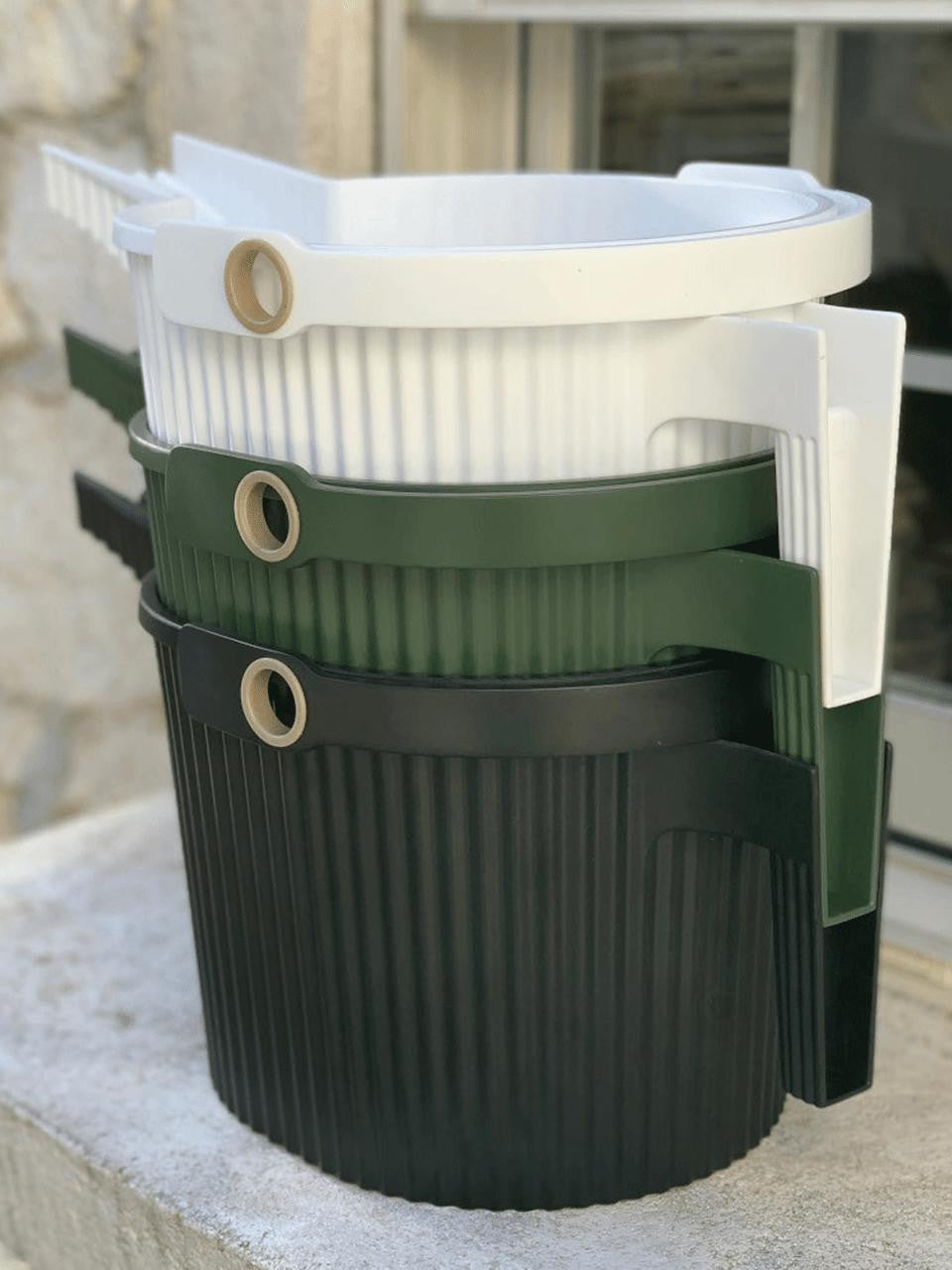 Black Hachiman Garden Beetle Watering Can with a compact 1.5L design, featuring a unique beetle shape for easy watering.
