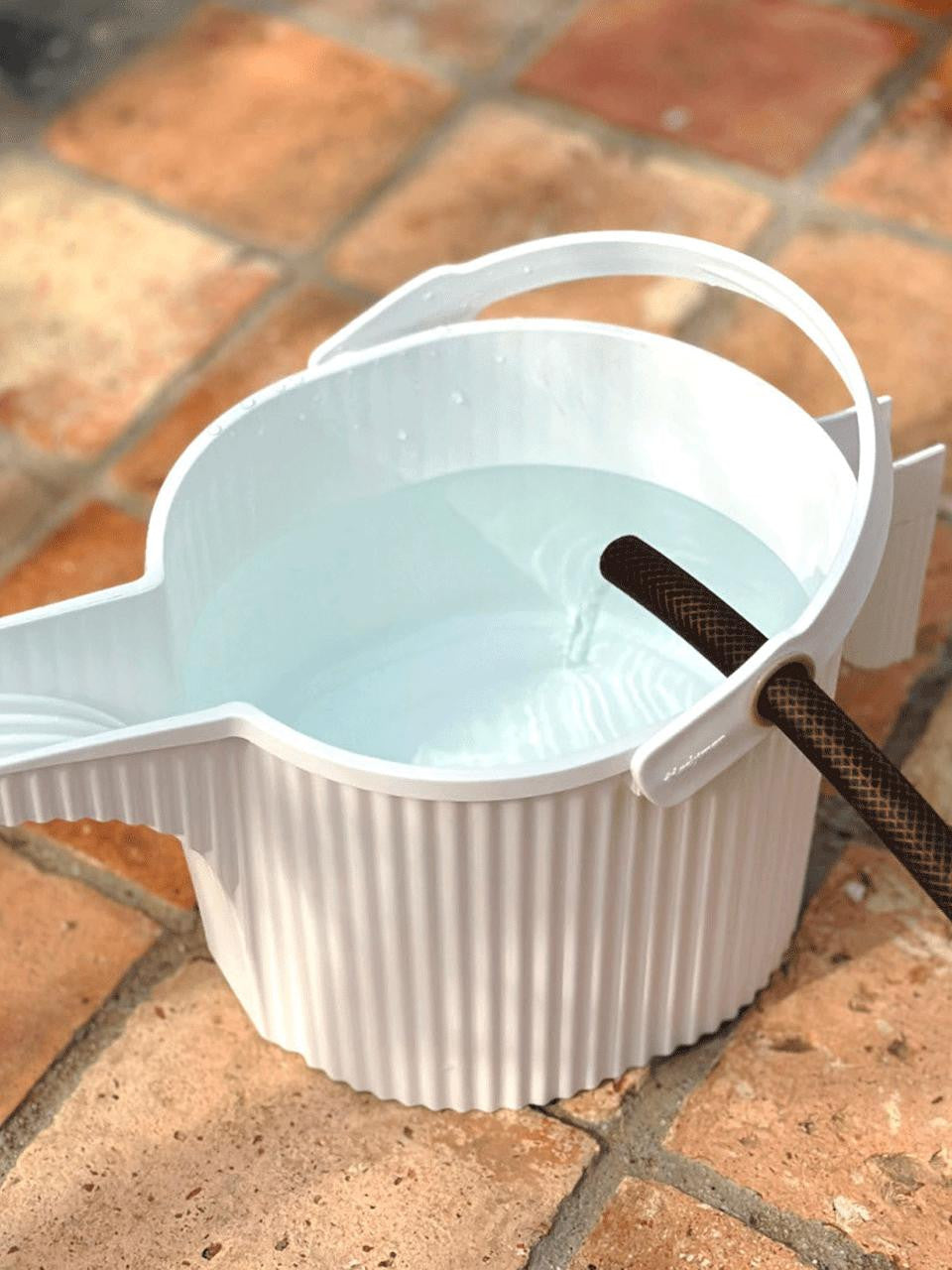 White Hachiman Garden Beetle watering can with a compact 1.5L capacity, featuring a detailed beetle design for garden watering.