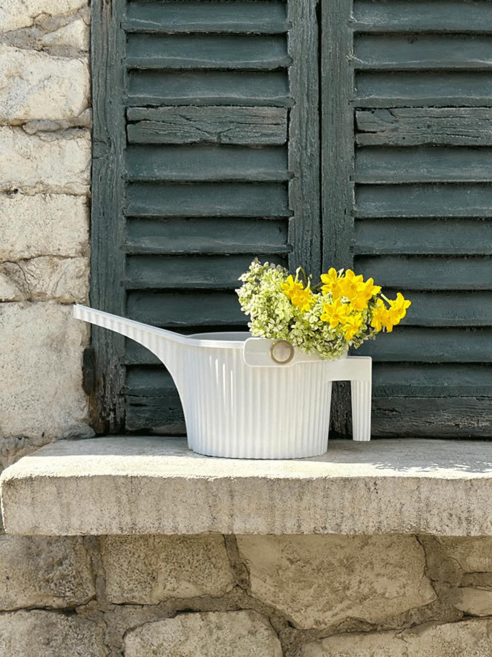 White Garden Beetle Watering Can by Hachiman with a compact design and 1.5L capacity, suitable for small garden watering tasks.
