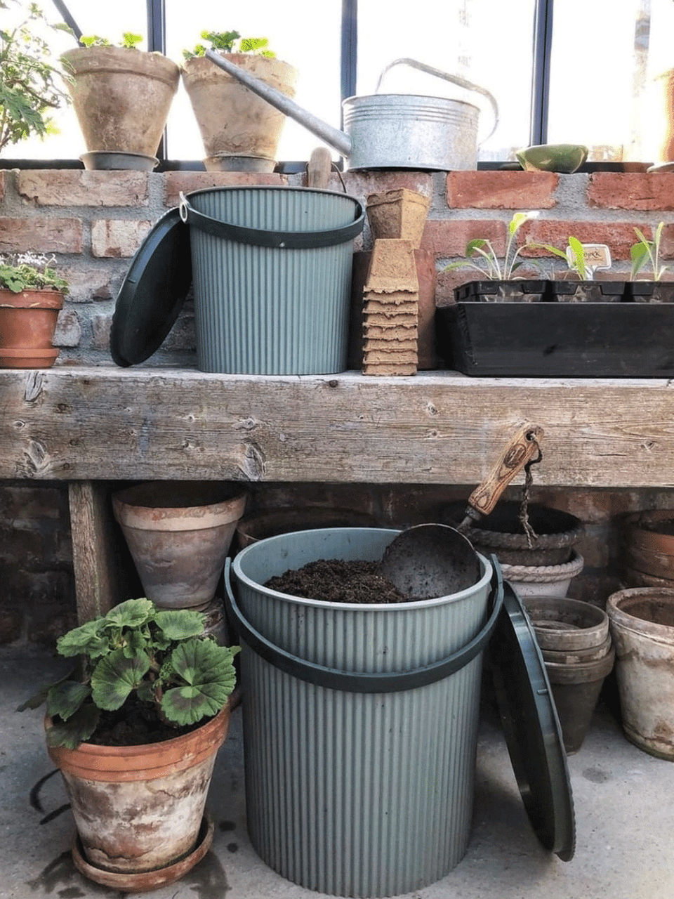 Green Omnioutil Super Bucket by Hachiman in small size, featuring a durable plastic construction with a handle.