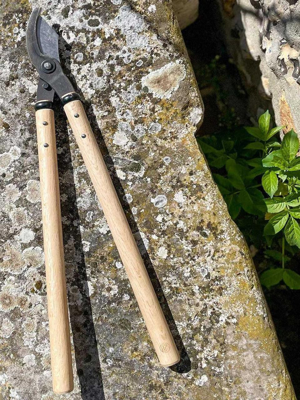 Kanenori Japanese Garden Loppers with ergonomic handles and sharp blades for precise pruning and trimming of plants.