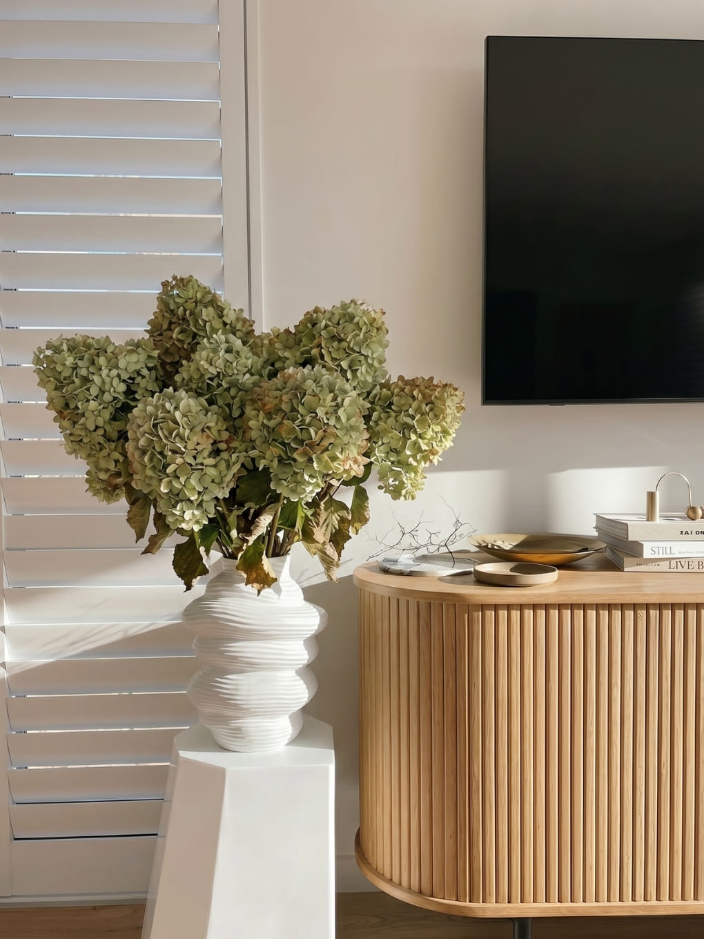 White Capas Vase by Ned Collections, elegant ceramic flower vase with a smooth finish and modern design.