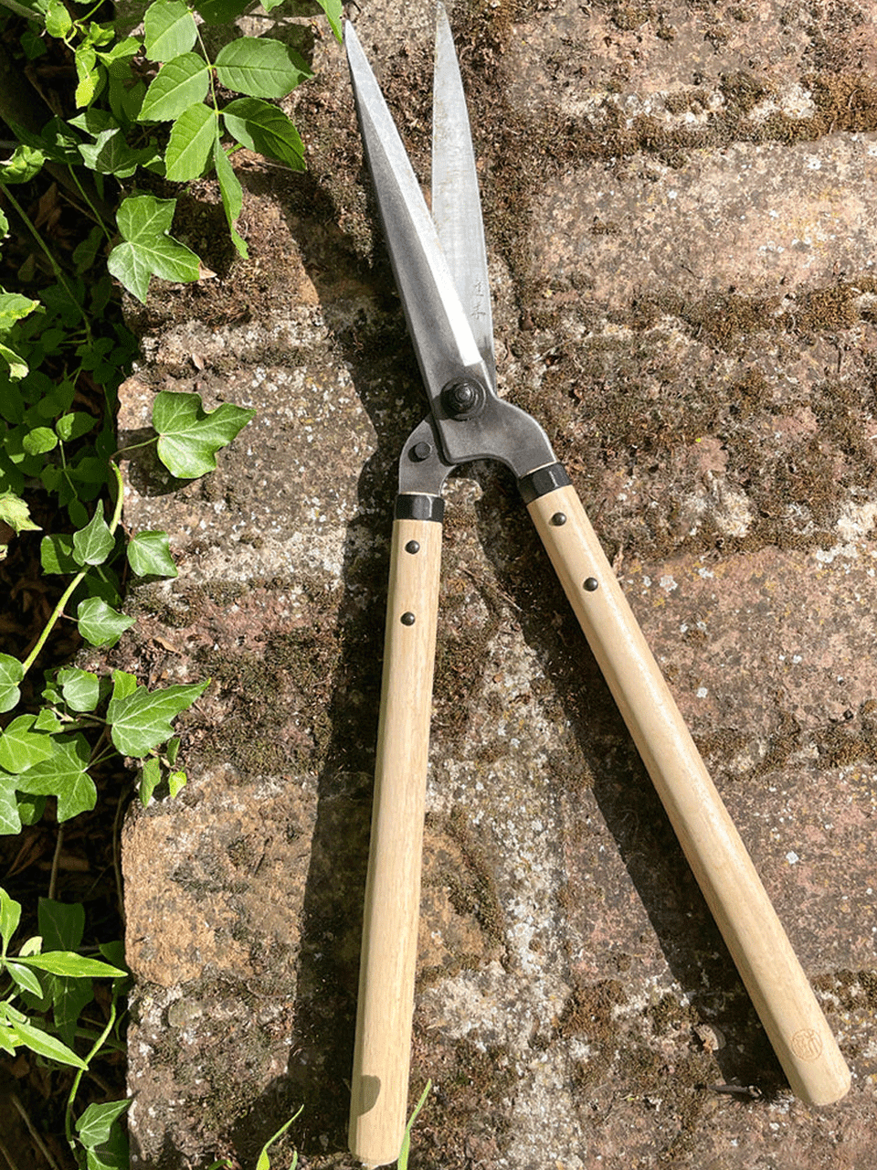 Niwaki Japanese Garden Shears with sharp blades and ergonomic handles for precise pruning and gardening tasks.