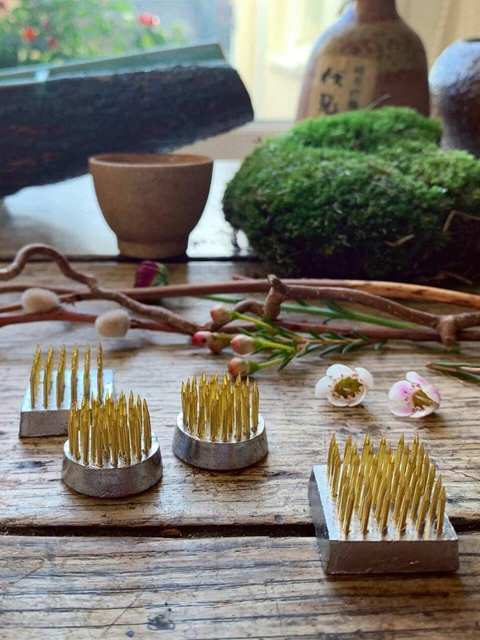 Niwaki Mini Kenzan Set with small floral pin holders for ikebana and flower arranging displays.