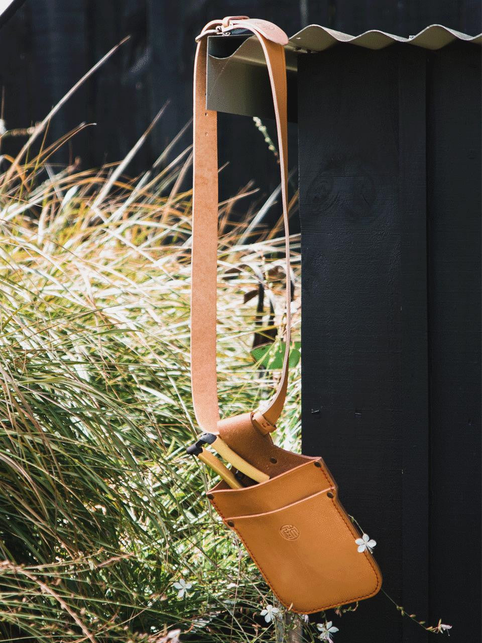 Niwaki Zenbu Pouch in neutral fabric with zipper closure, designed for organizing small accessories or stationery.
