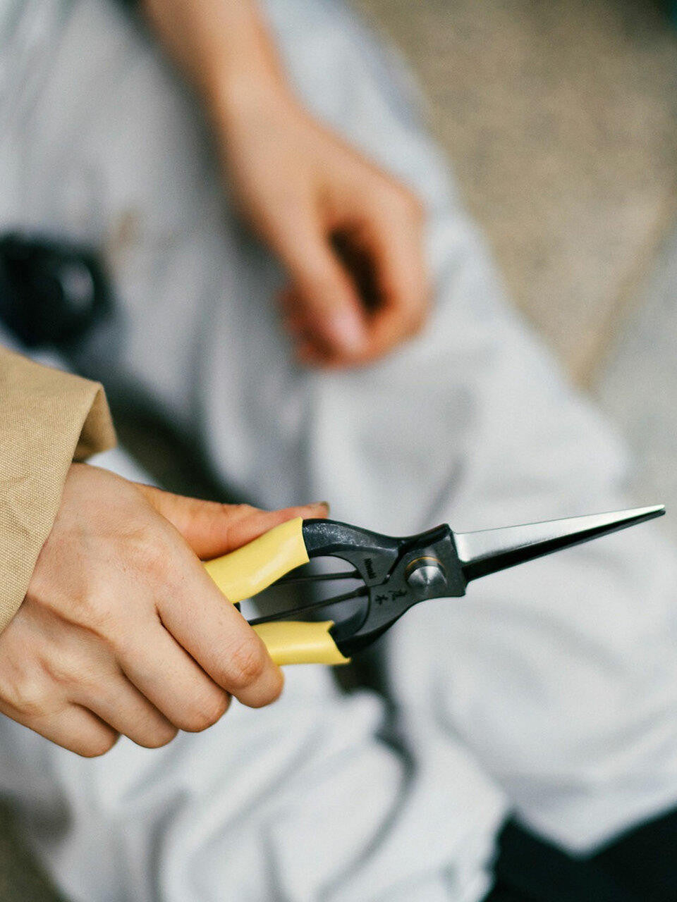 Niwaki GR Pro Snips with black handles and sharp blades, designed for precise pruning and gardening tasks.